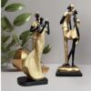 Xtore Stylish Golden Black Resin Romantic Couple Statues Pack of 2 - LXINDIA.COM