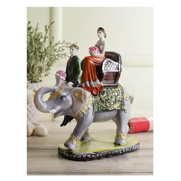 CraftVatika Love Couple Sitting on Elephant Statue Multicolour 1 1 - LXINDIA.COM