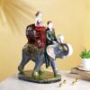 CraftVatika Love Couple Sitting on Elephant Statue Multicolour - LXINDIA.COM